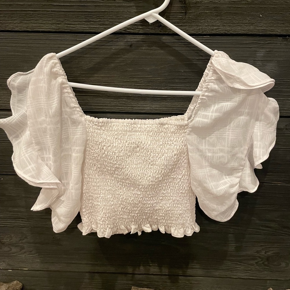 White ruffle sleeve top